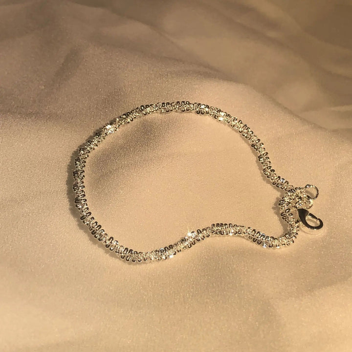 Glansfuldt armbånd
