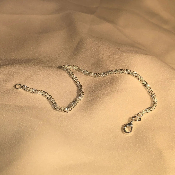 Glansfuldt armbånd